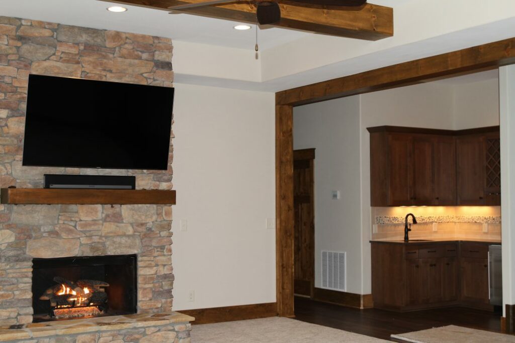 Lot-68-OWC-Downstairs-Fireplace-and-Bar-1030x687